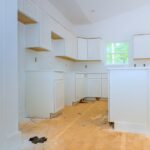 In,Newly,Constructed,House,,Wooden,White,Kitchen,Cabinets,Are,Being